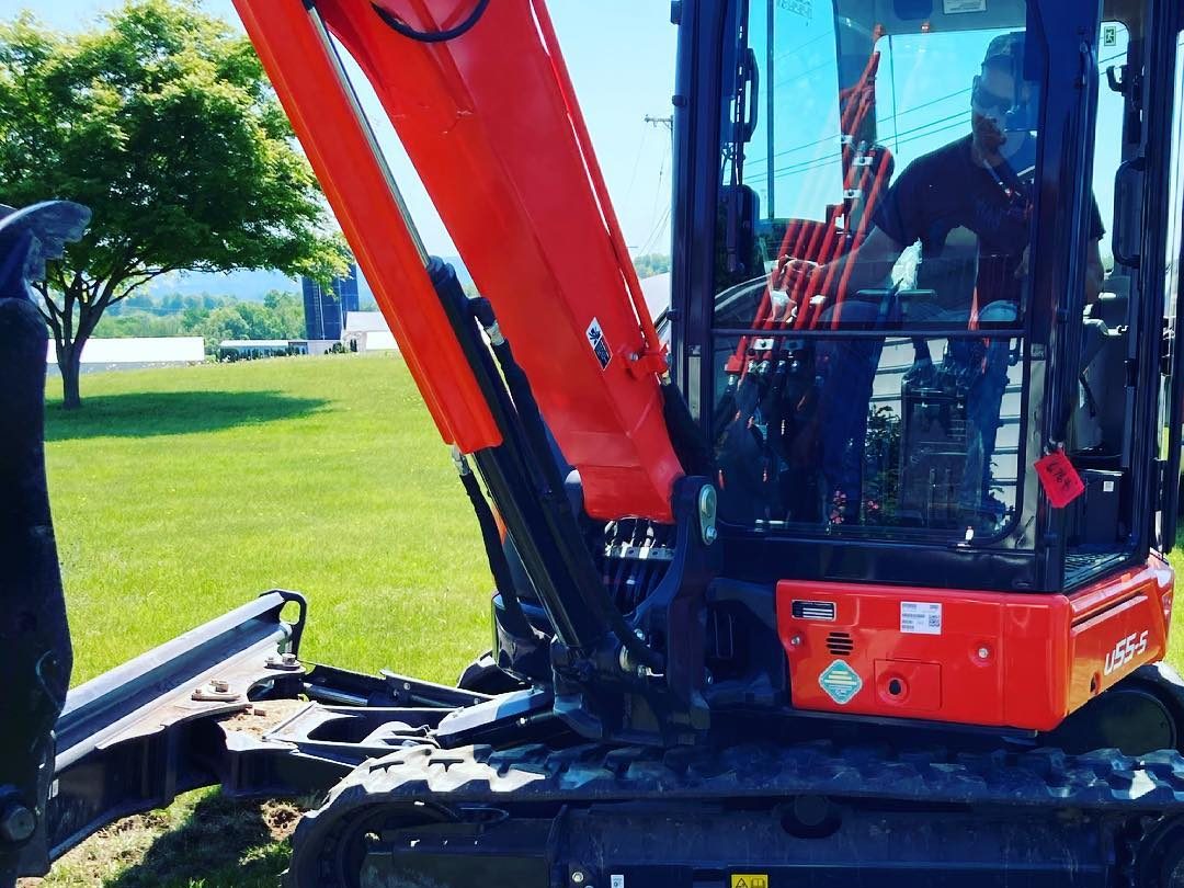 A man operating an excavation machine.
